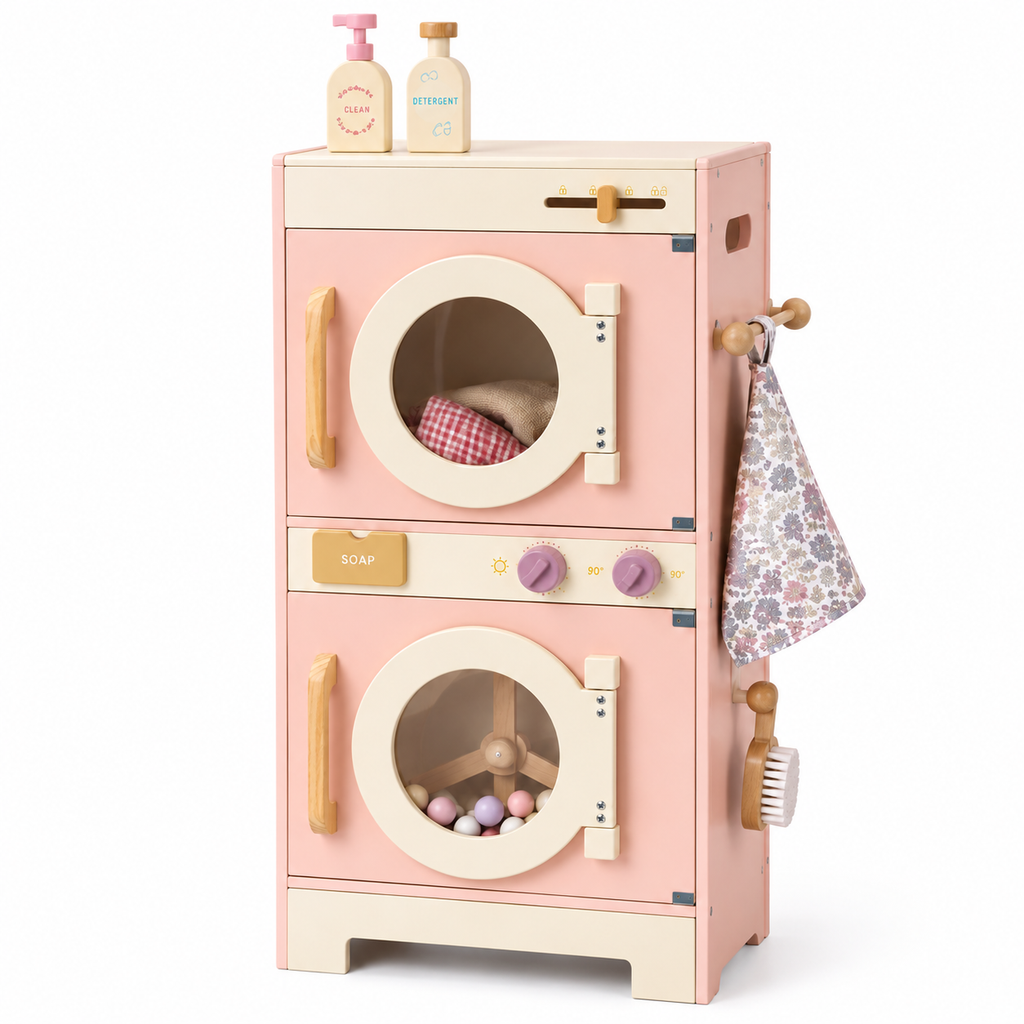 Machine à laver enfant en bois rose avec accessoires de buanderie sur fond blanc.